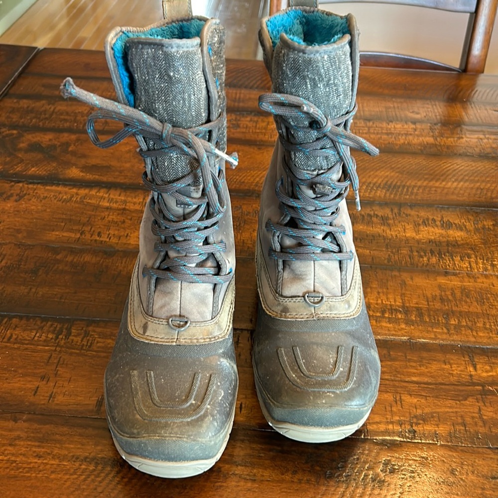 Northface winter boots.  Loved but have lots of life left.